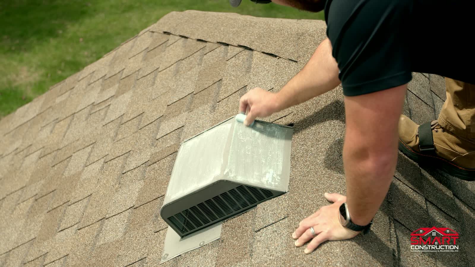 Contractor documenting roof vent and shingle condition for storm damage paperwork support.