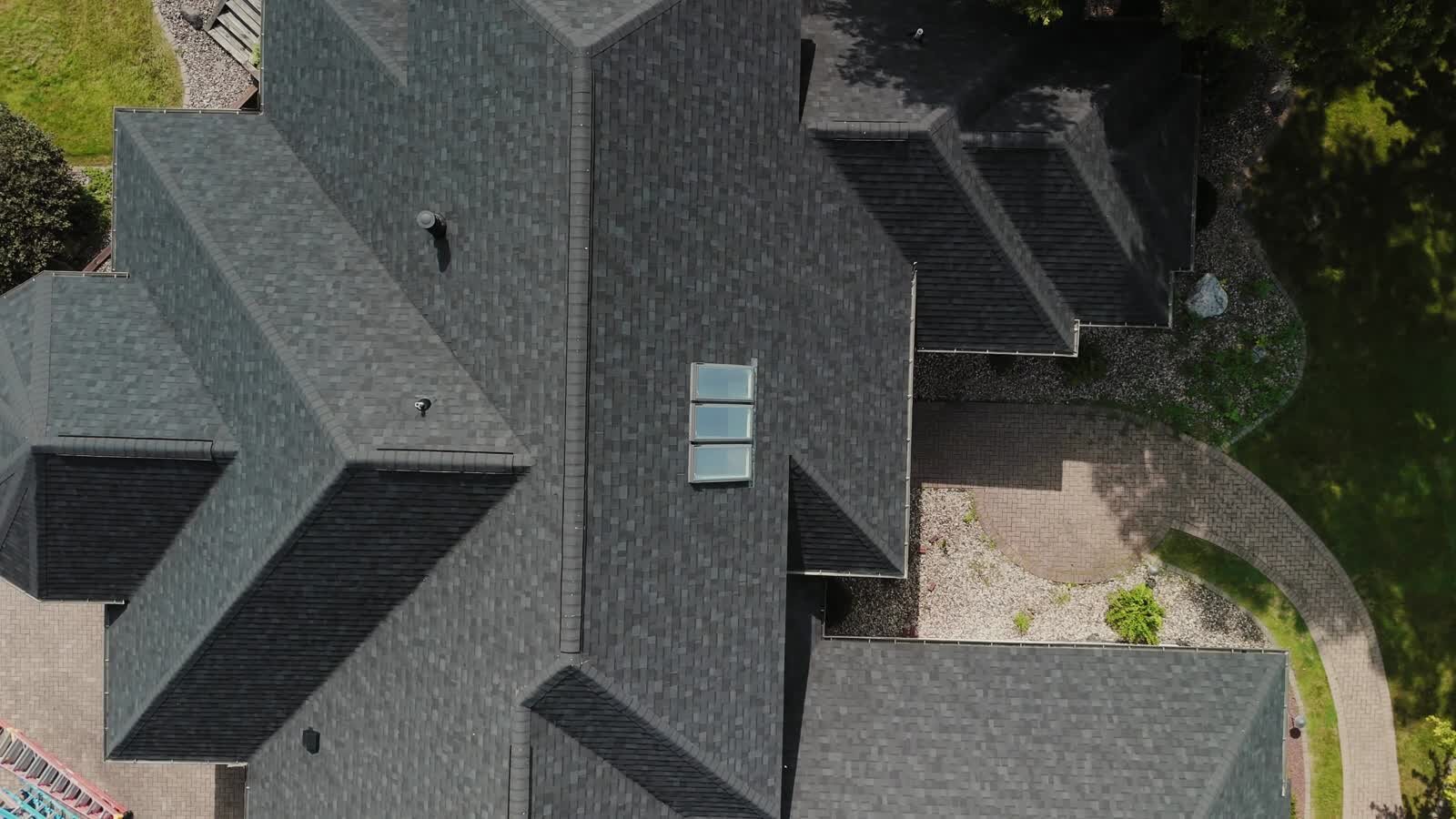 Drone view of roof planes used for a roof recovery inspection and documentation package.